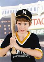 Adam (age 10) posing with a baseball bat. Taken in 2002 for a baseball card listing his team as 'Danbury Hospital', his fav pro as 'Norma Garciaparra', position as 'Right Field', height '4ft7' and weight 60.