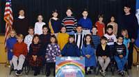 Adam (second-left middle row) in his first grade class photo at Sandy Hook Elementary School in 1998.